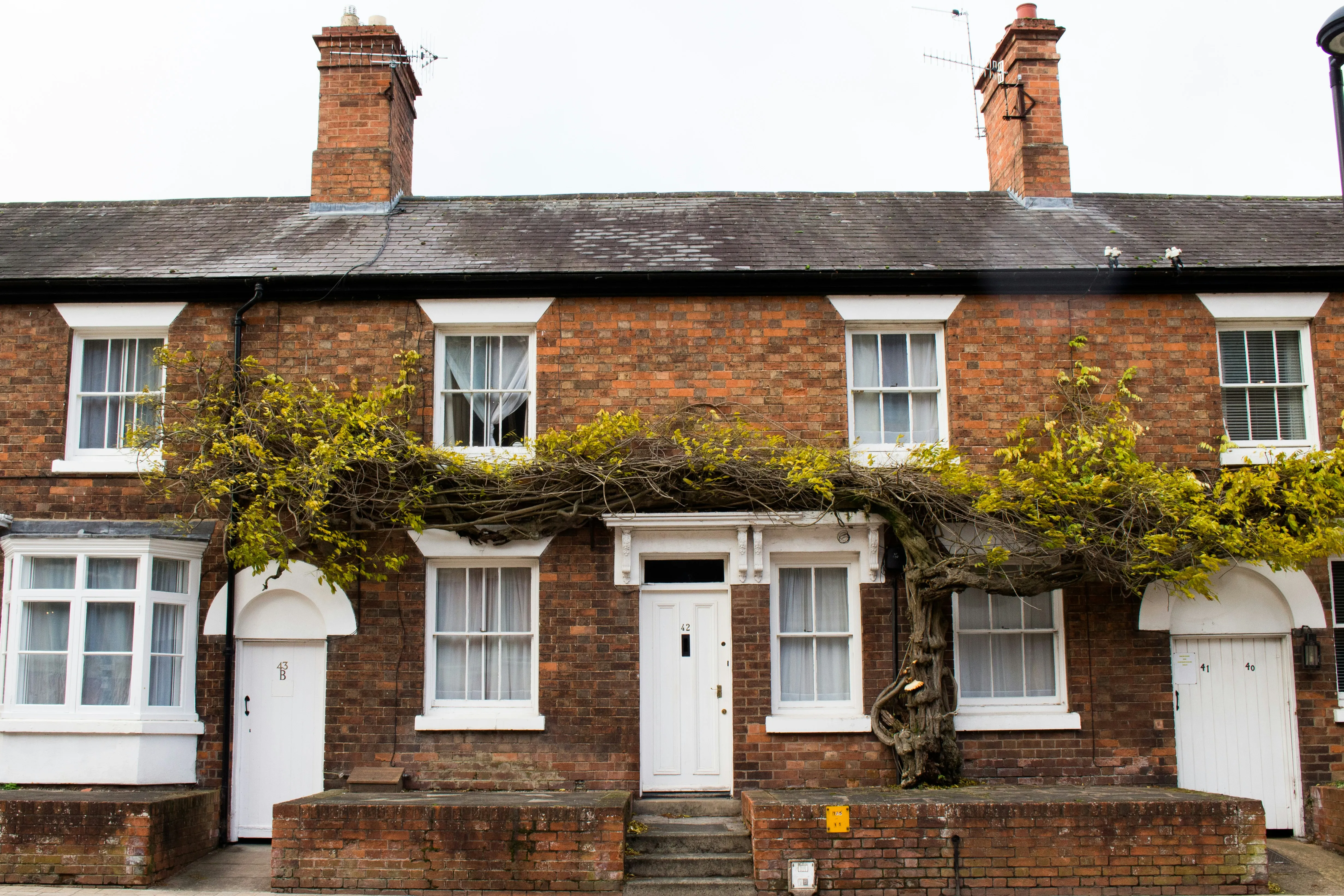 A UK Victorian-era brick terrace, typical of the housing stock found along Caversham's older streets.